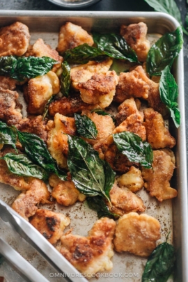 Homemade salt and pepper chicken served in a tray