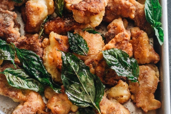 Homemade salt and pepper chicken served in a tray