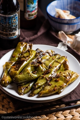 Szechuan Pan Fried Peppers (Tiger Skin Peppers, 虎皮尖椒) - These peppers are pan fried until blistered and tender, then cooked in a sour, savory sauce. A great vegan dish that is hot, flavorful, and appetizing! | omnivorescookbook.com