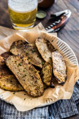 Cook the best grilled potato by slicing it finely, grill until blistered on the surface and creamy in texture. Add cumin and chili powder to spice it up.