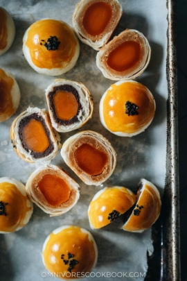 Modern mooncake with red bean and lotus seed paste and egg yolk