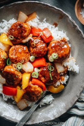 Meatballs with sweet and sour glaze over rice