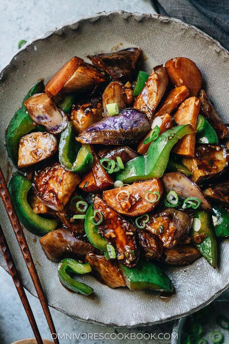 Stir fried eggplant, potato and pepper close up