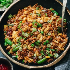 Homemade pork fried rice with eggs and veggies