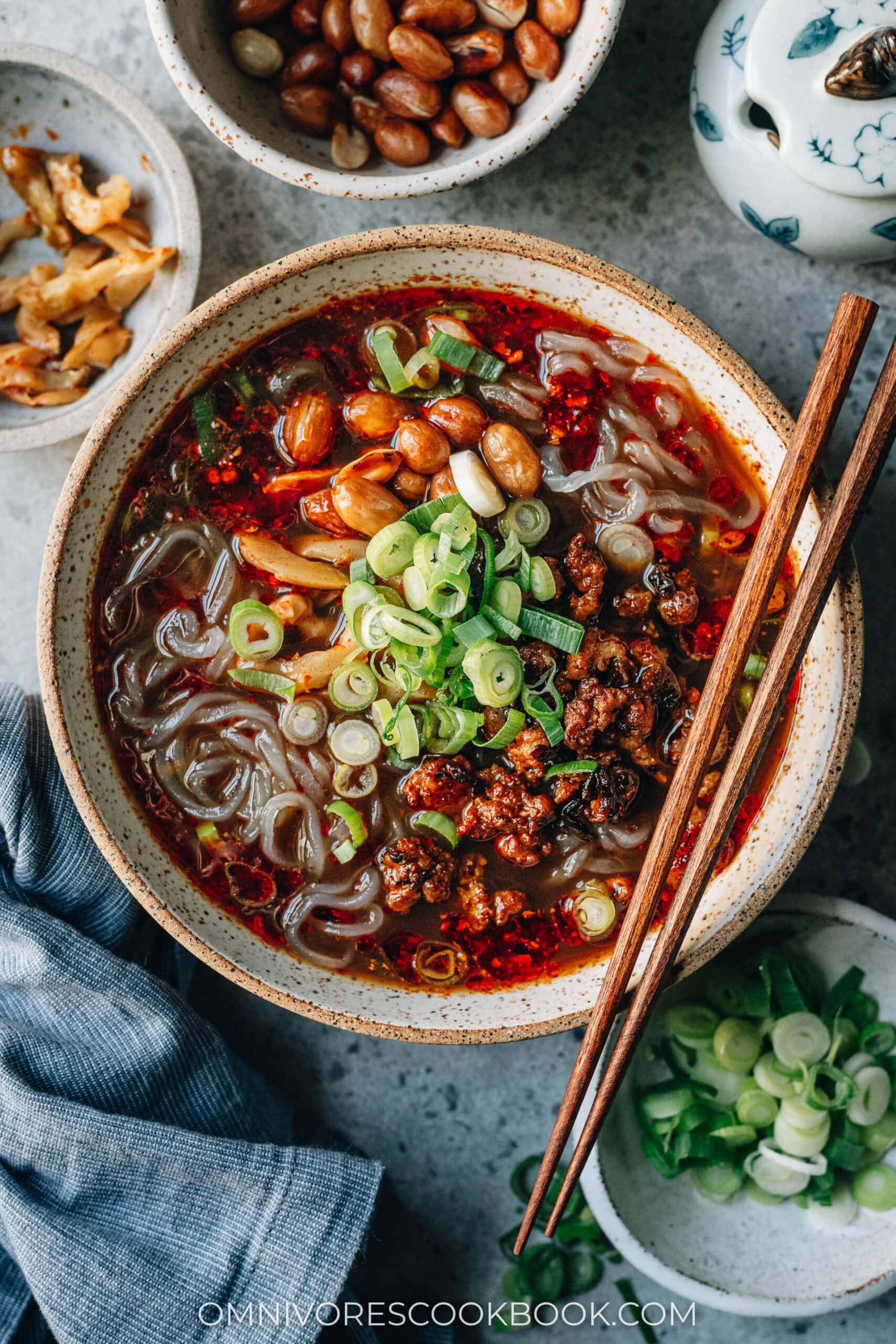 Homemade suan la fen with ground pork, peanuts, and green onion