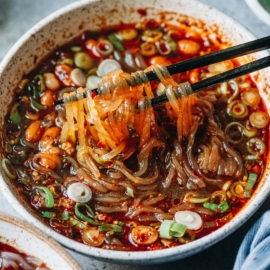 Suan La Fen close up pulling noodles