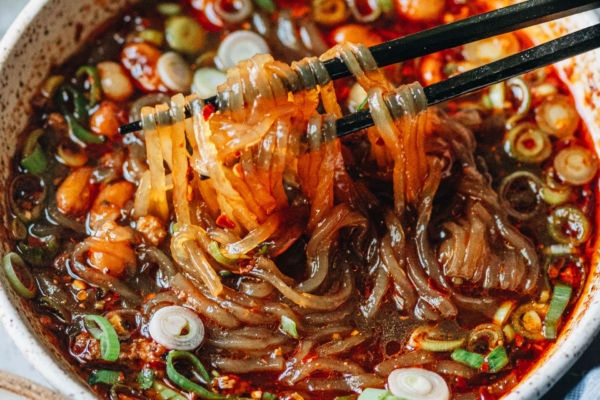 Suan La Fen close up pulling noodles