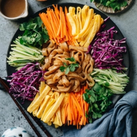 Northern Chinese potato noodles in sesame sauce with vegetables and eggs