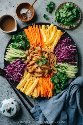 Northern Chinese potato noodles in sesame sauce with vegetables and eggs