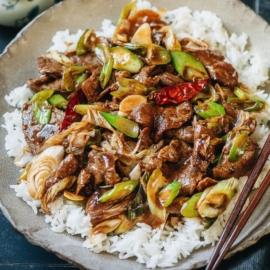 Northern Chinese style scallion beef stir fry over rice